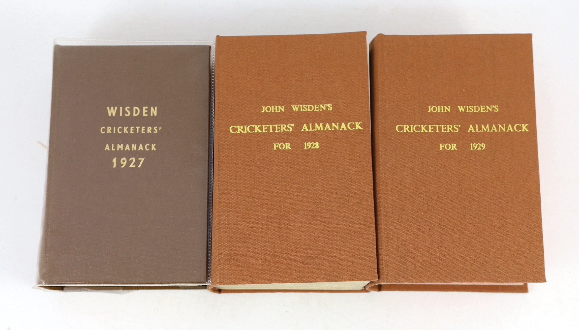 Wisden, John - Cricketers’ Almanack for the years 1919 (56th edition) - 1929 (66th edition), all rebound brown cloth gilt, and retaining original paper wrappers, bar issues of 1920-21, which lack wrappers and early adver